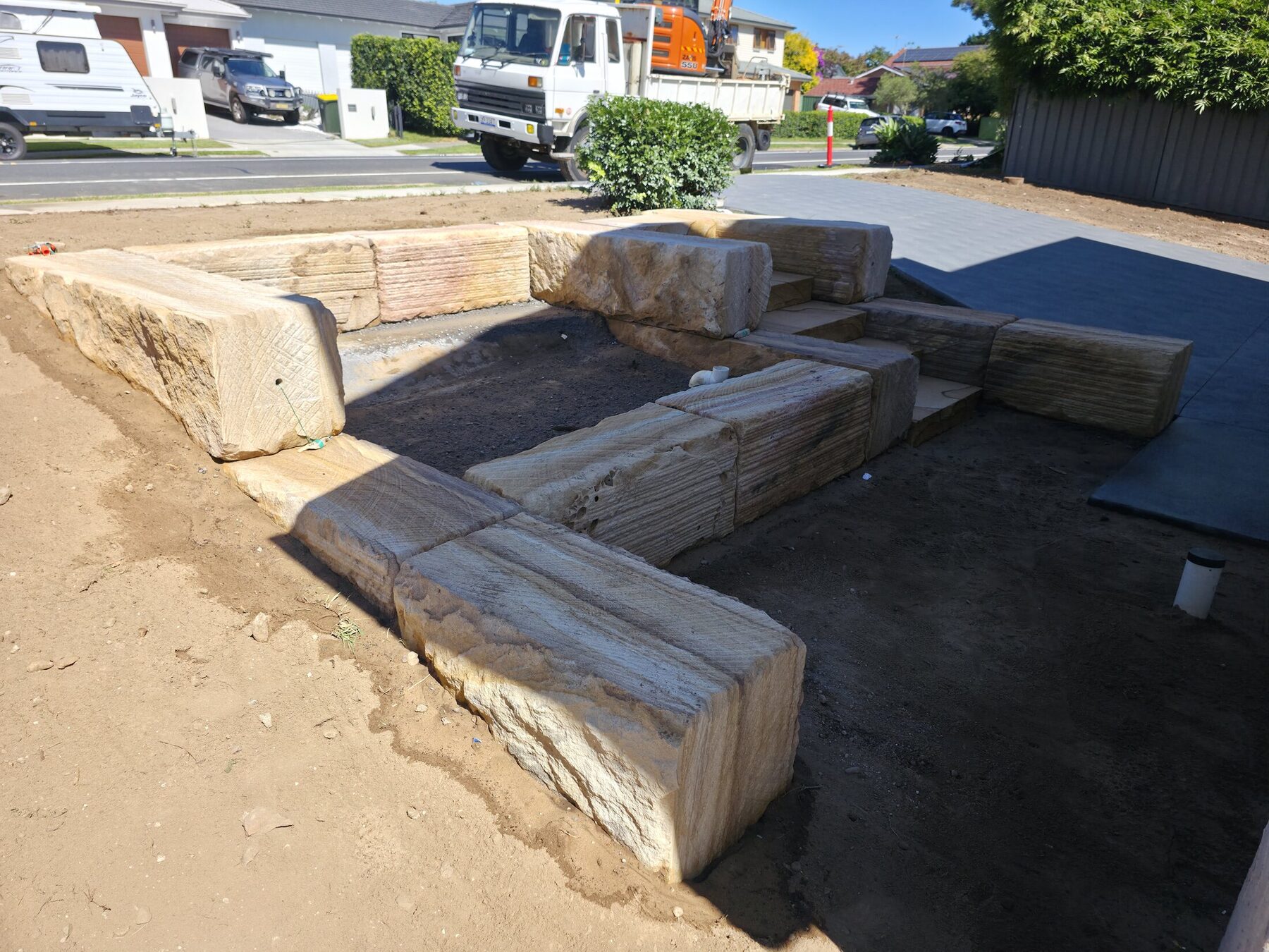 Completed sandstone entrance and garden access paths