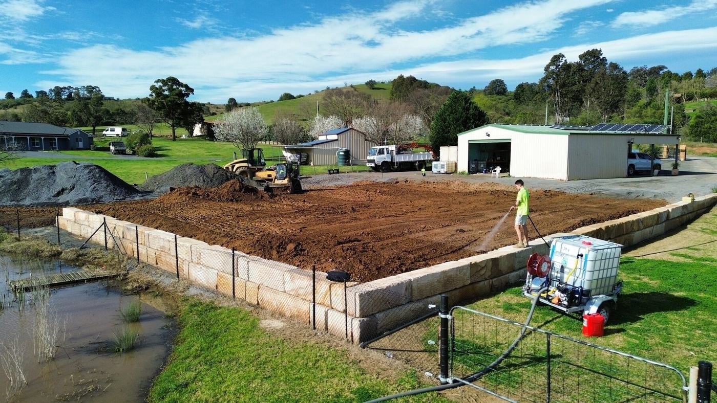 Raised platform and sandstone wall after stage completion