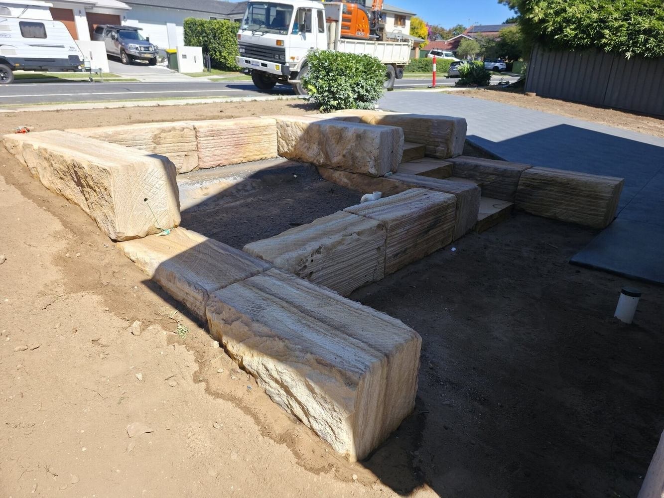 Finished MTS sandstone entrance, paths and structural landscaping
