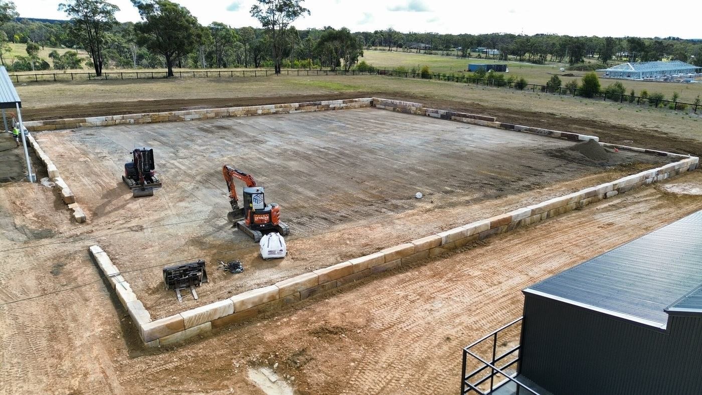 Aerial view of Buxton equine-property earthworks and sandstone retaining completed by MTS