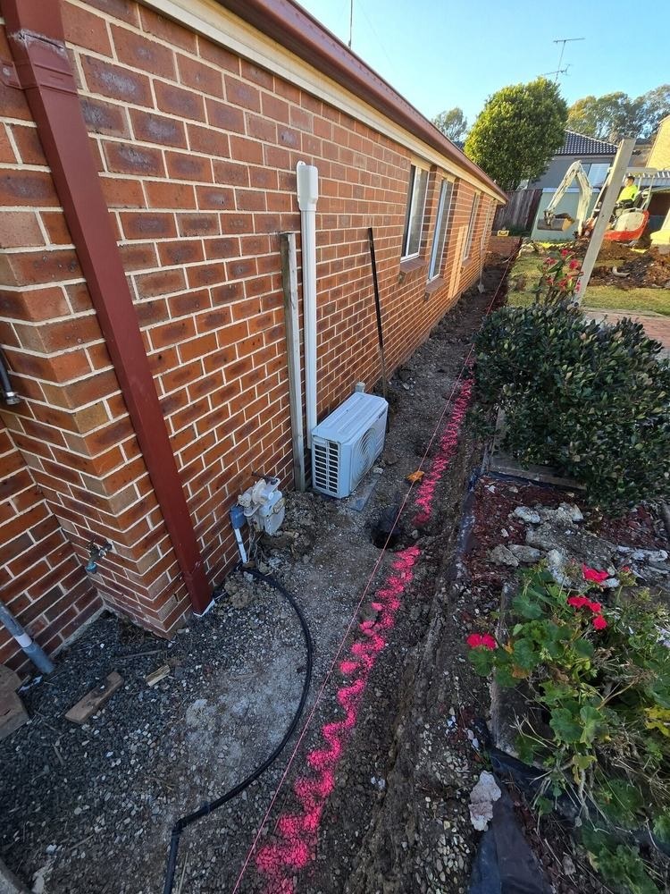 Concrete sleeper wall and fence replacement in progress