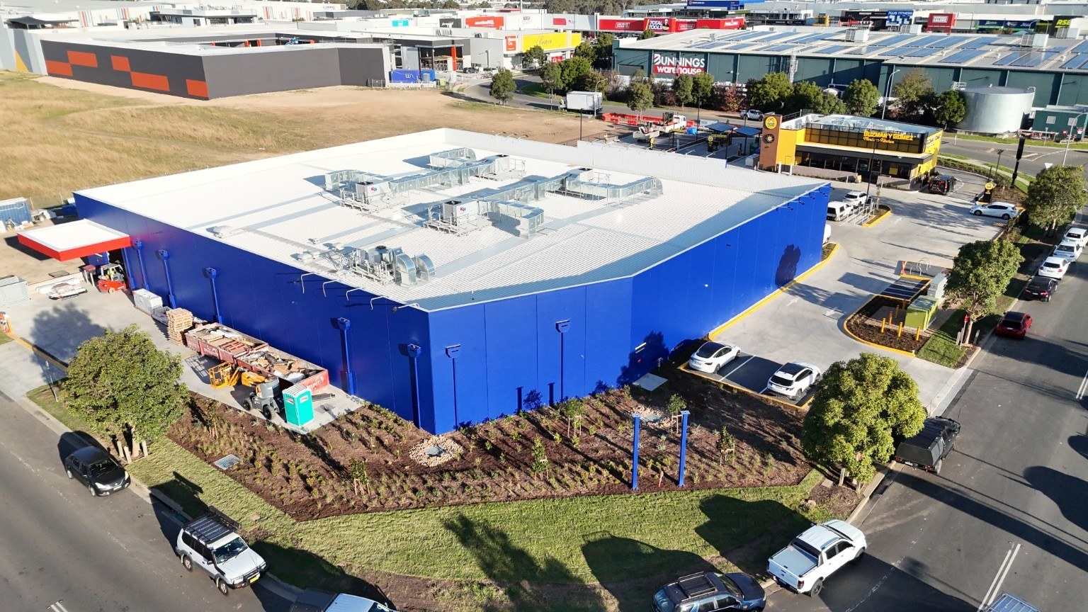Completed commercial carpark planting and landscape beds by Moores Trades and Services